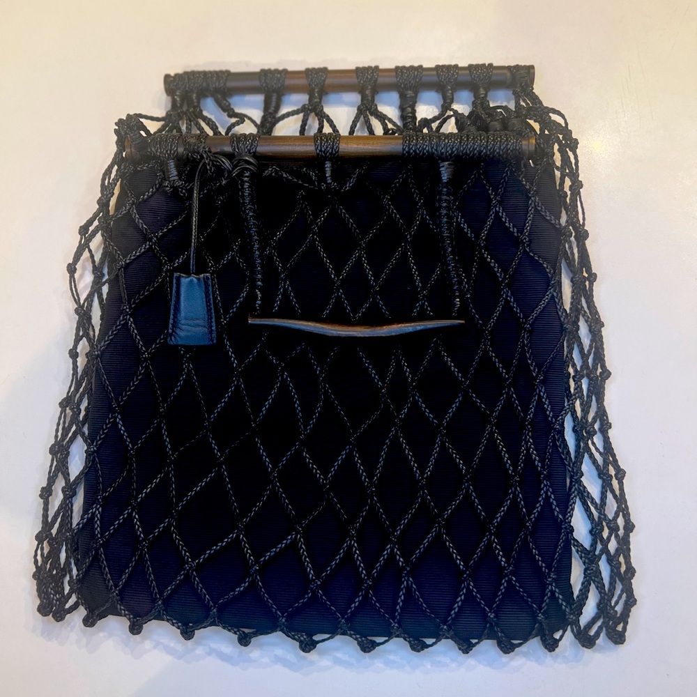 Gucci Authentic Braided Drawstring Handbag (Serial No. 106265203998)